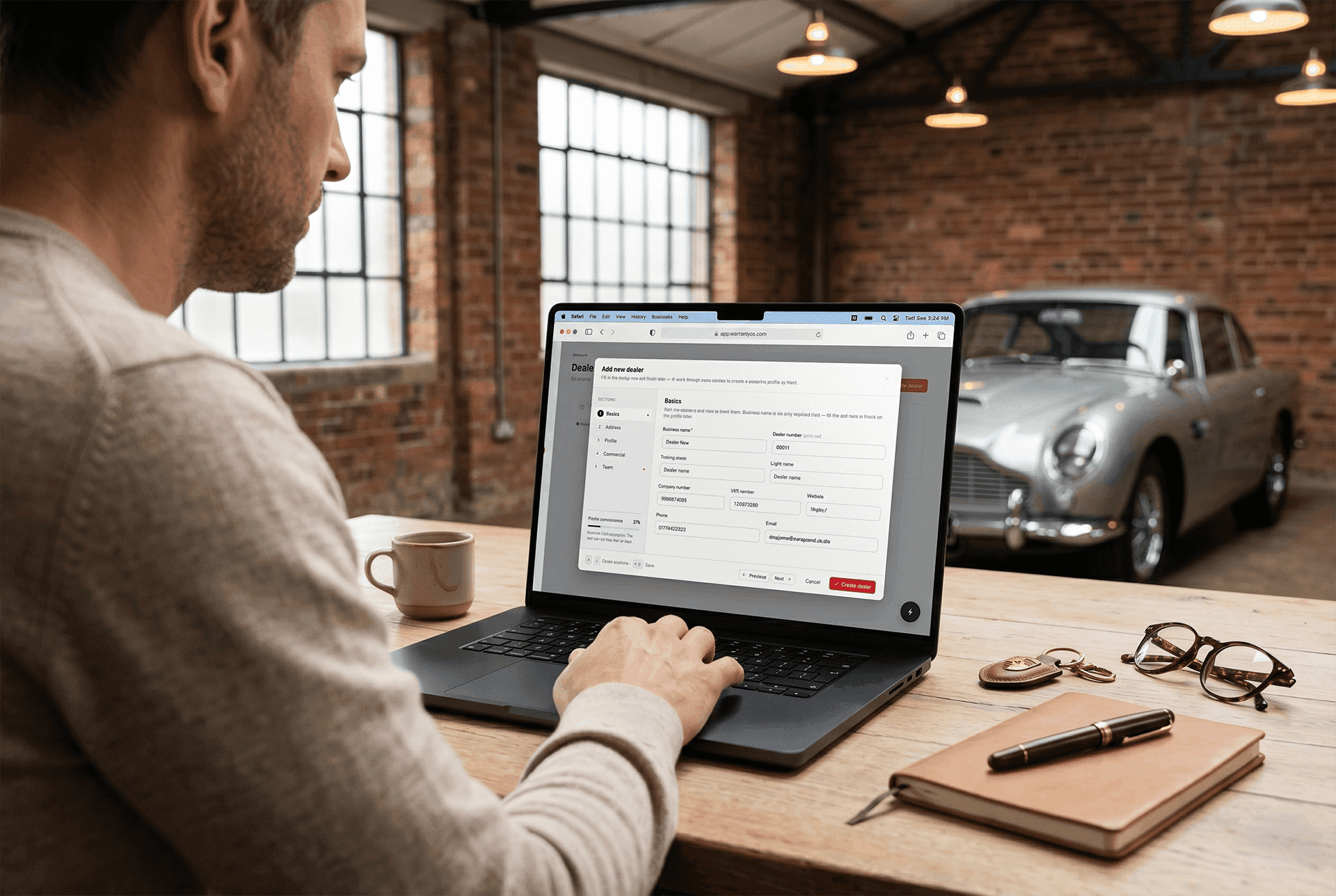 WarrantyOS dealer onboarding workflow shown on a laptop in a showroom